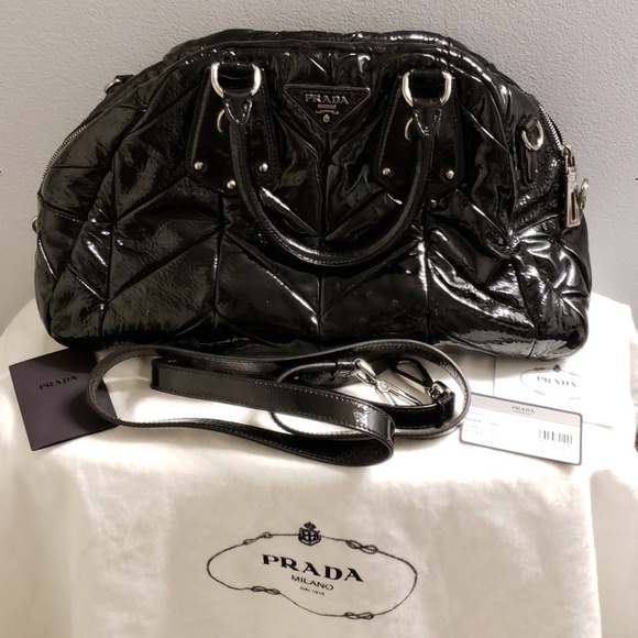 Prada Handbags - SOLD!! NEVER USED PRADA BAULETTO